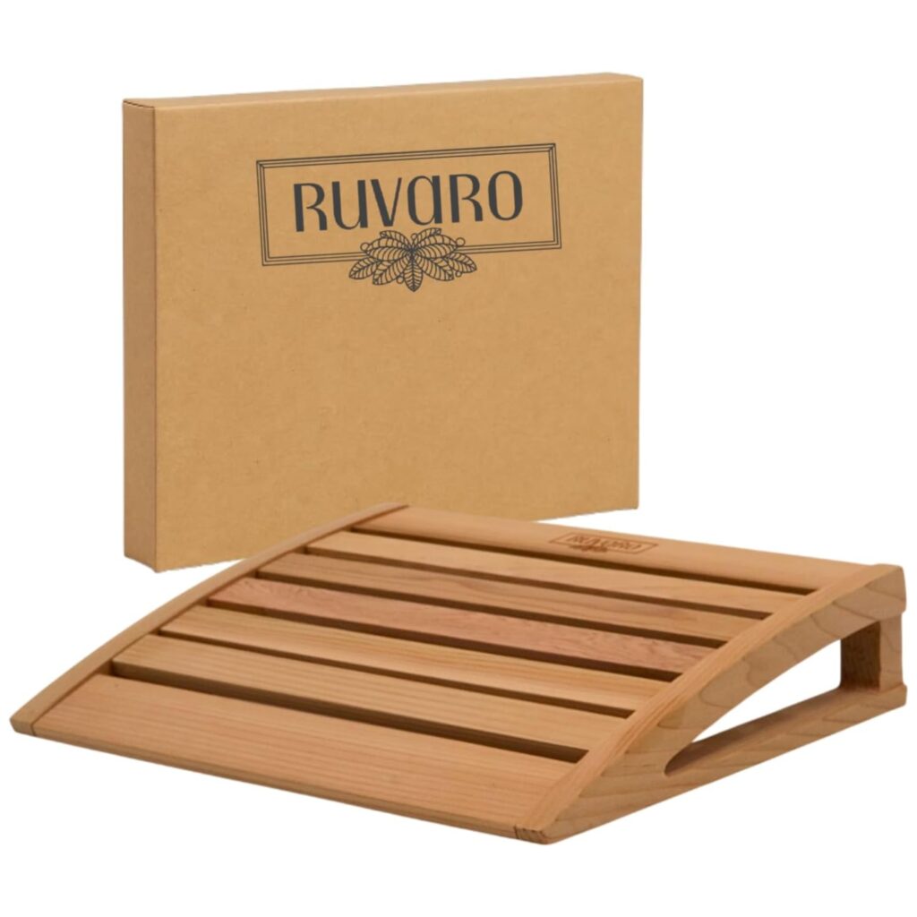 RUVARO sauna headrest made from Canadian red cedar with a curved open slat surface and branded gift box